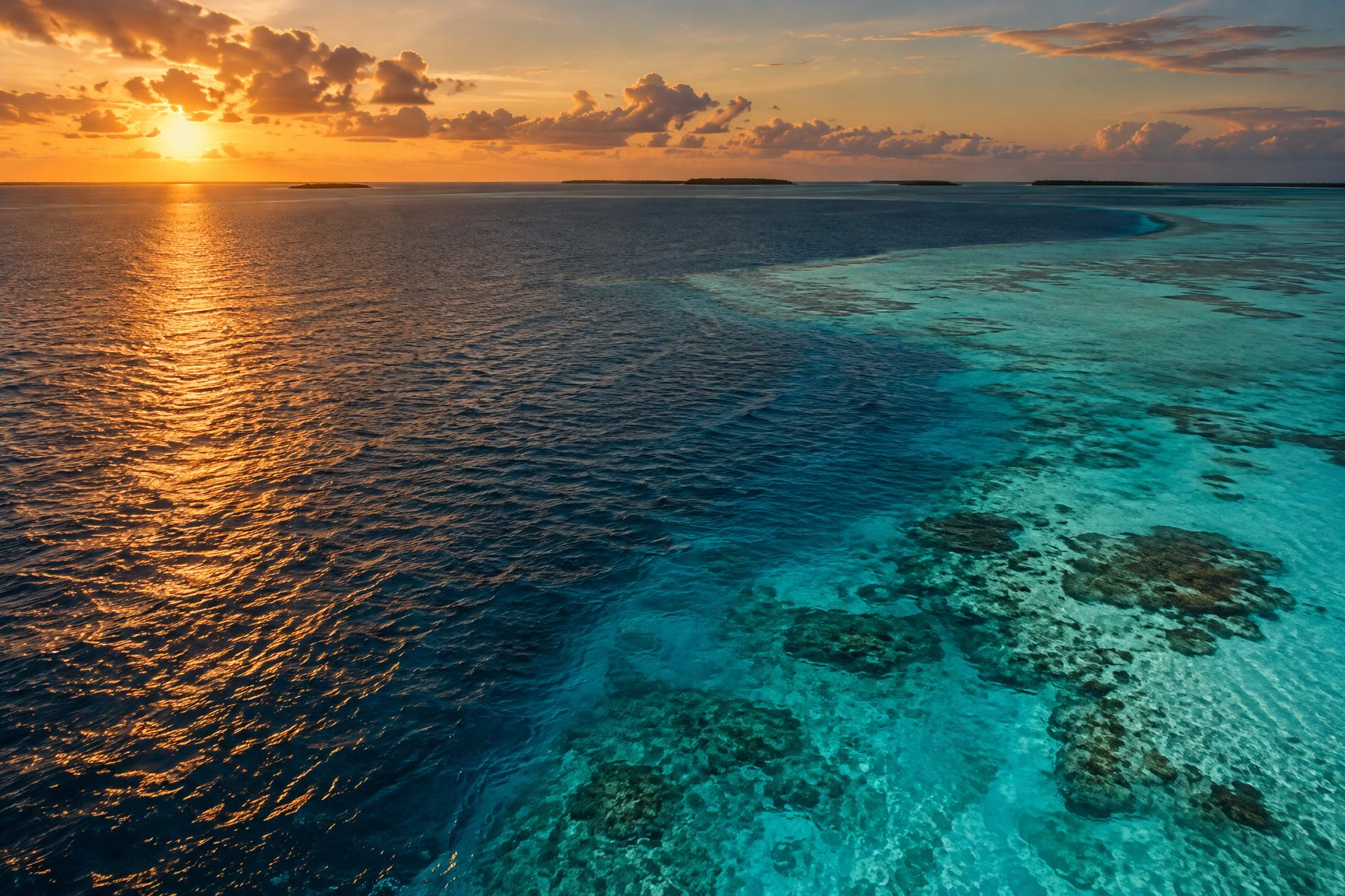 Illustrative open turquoise water and reef far from shore